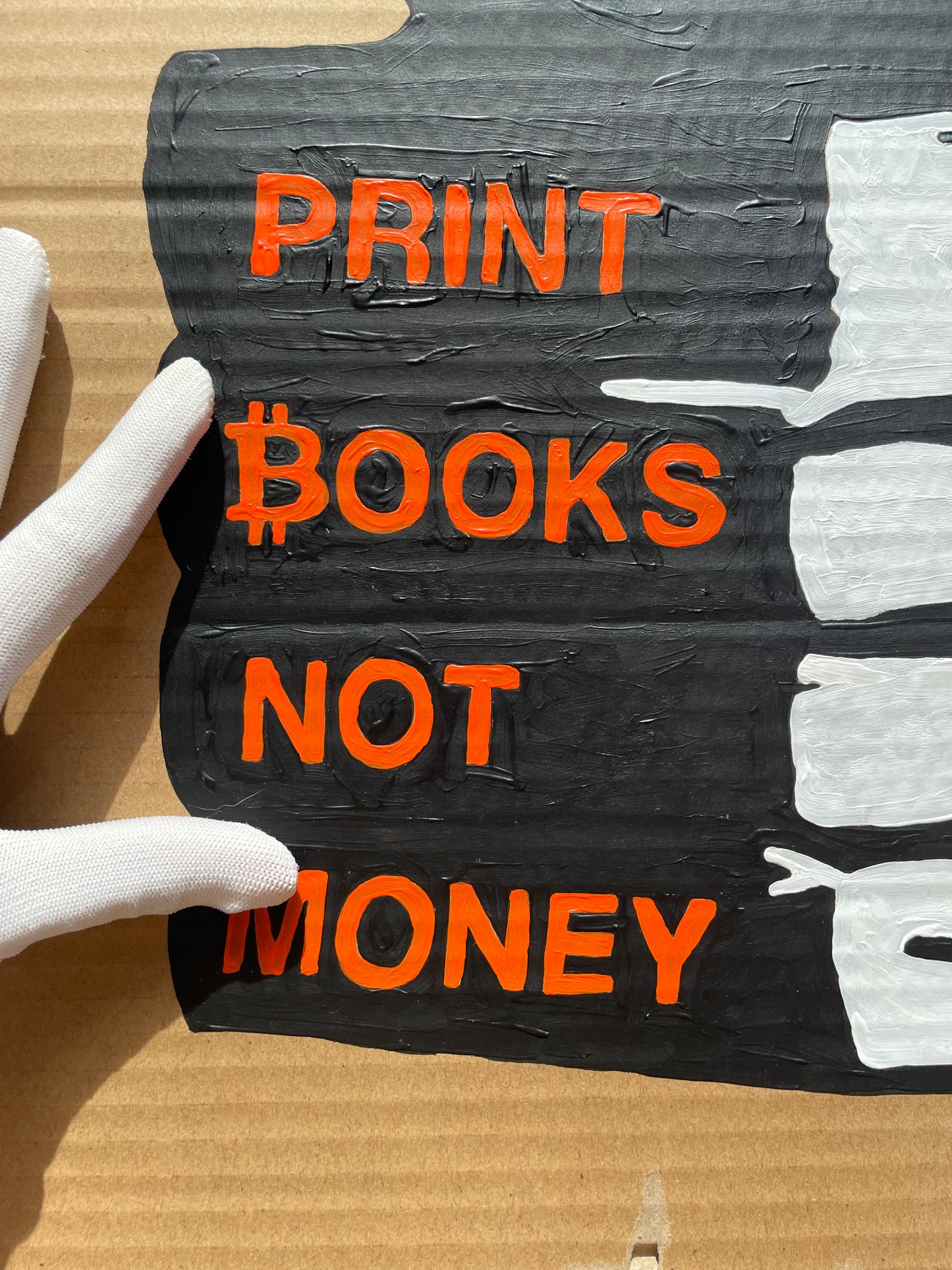 Acrylic Paint on Cardboard "Print Books, Not Money"